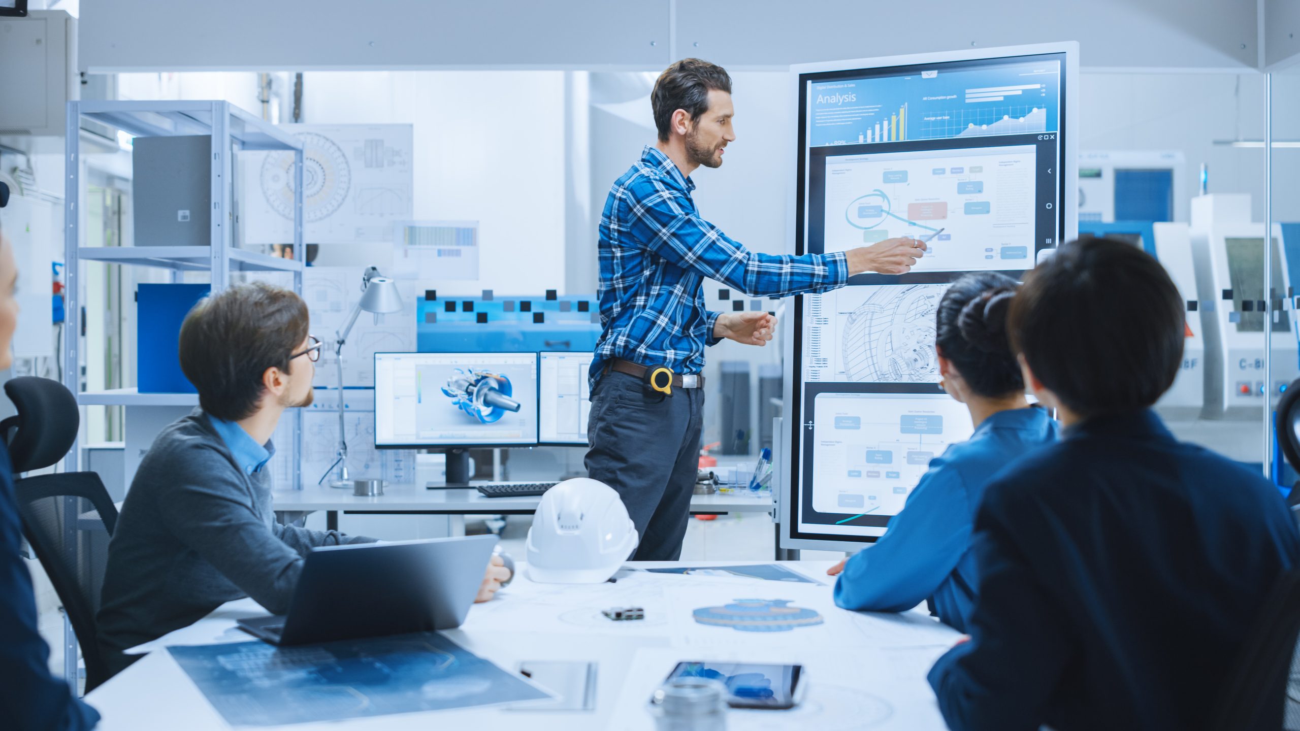 On a Meeting Chief Industrial Engineer Reports to a Group of Specialists, Managers, Uses Digital Whiteboard to Show Statistics and New Eco-Friendly Engine Concept. Sustainable Green Energy Research